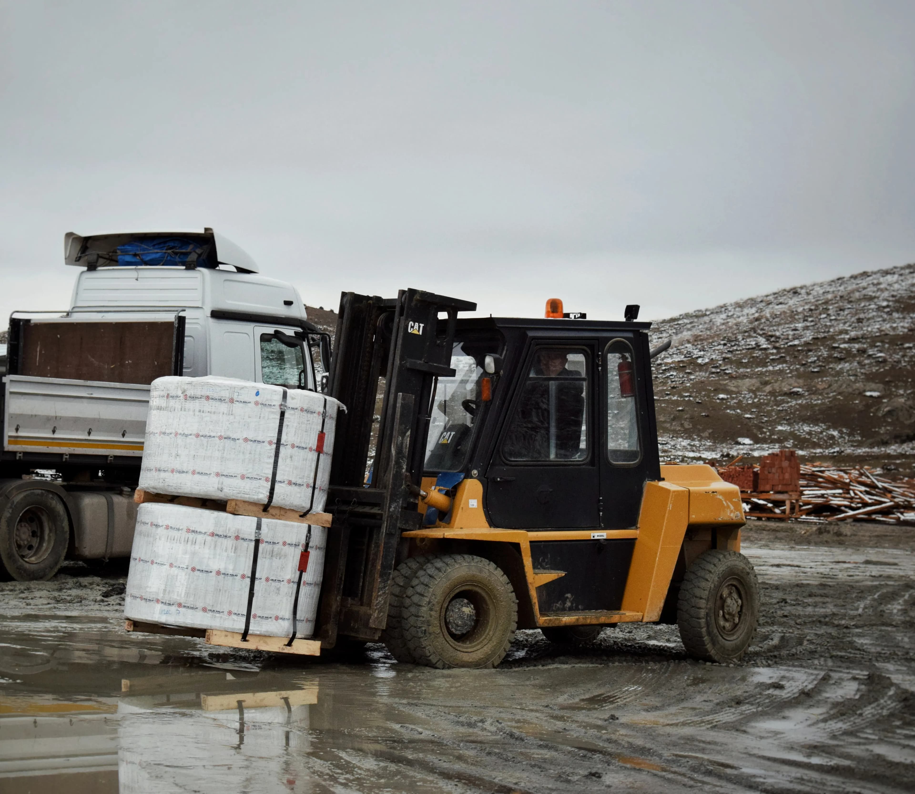 Cargo being handled inside a logistics facility